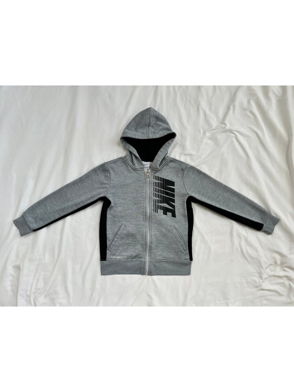 Nike kids size large (size 6-7) grey zip up hoodie
